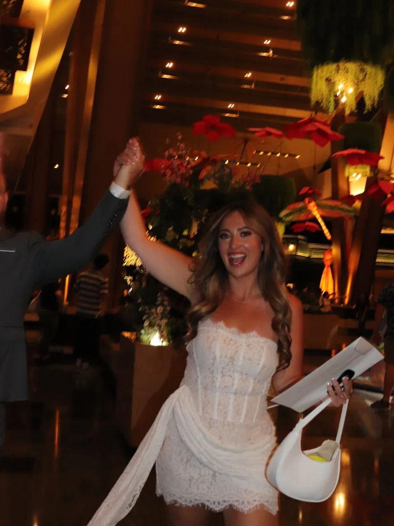 Newlyweds celebrating in luxurious wedding venue setting