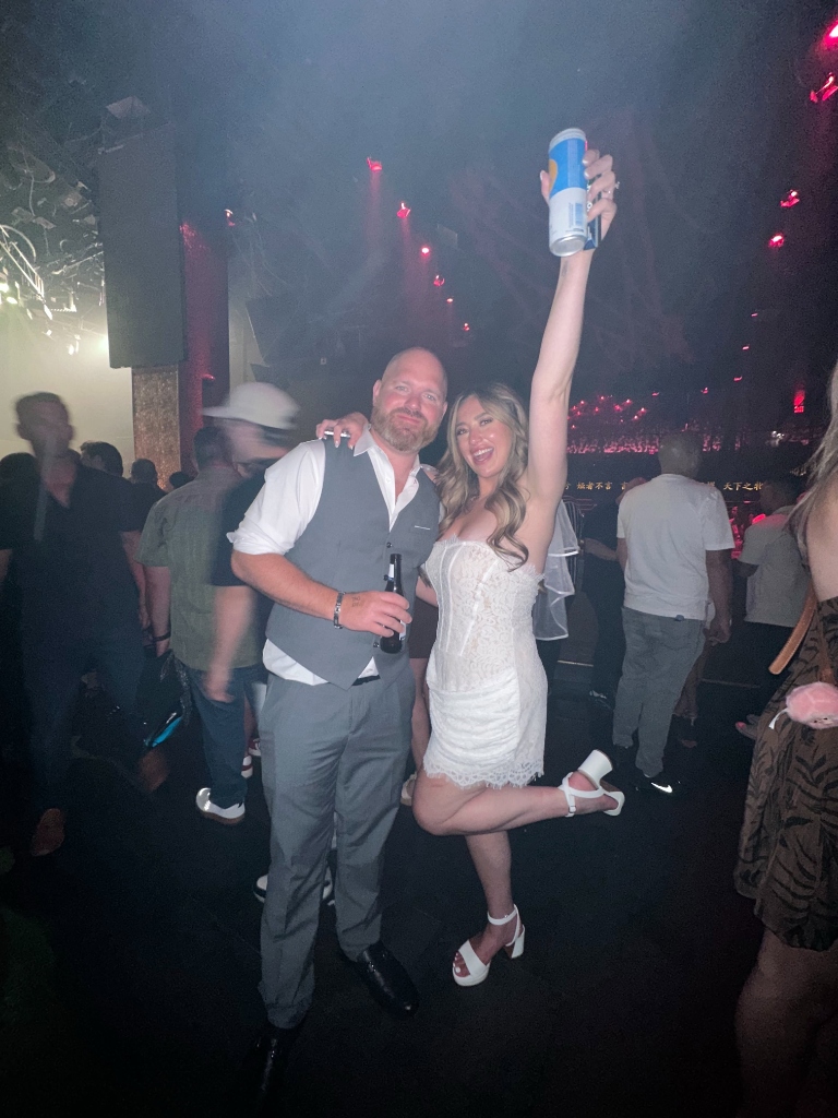 Newlyweds dancing on energetic dance floor